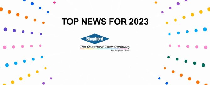 Shepherd Color Company's Top News for 2023 graphic with diamond logo and colorful scattered dots on a white background.