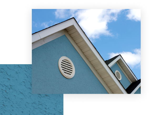 Modern home exterior with turquoise-blue textured stucco cladding, demonstrating durable pigments in concrete and stucco applications.