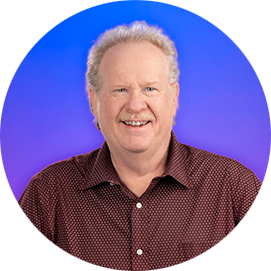 Professional headshot of a man wearing a dark shirt against a blue-to-purple gradient circular background.