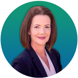 Professional headshot of a woman with reddish-brown hair wearing a dark blazer against a teal-green circular background.