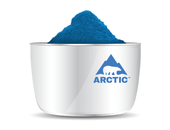 Metallic silver can overflowing with bright blue pigment powder, Arctic brand with polar bear logo.