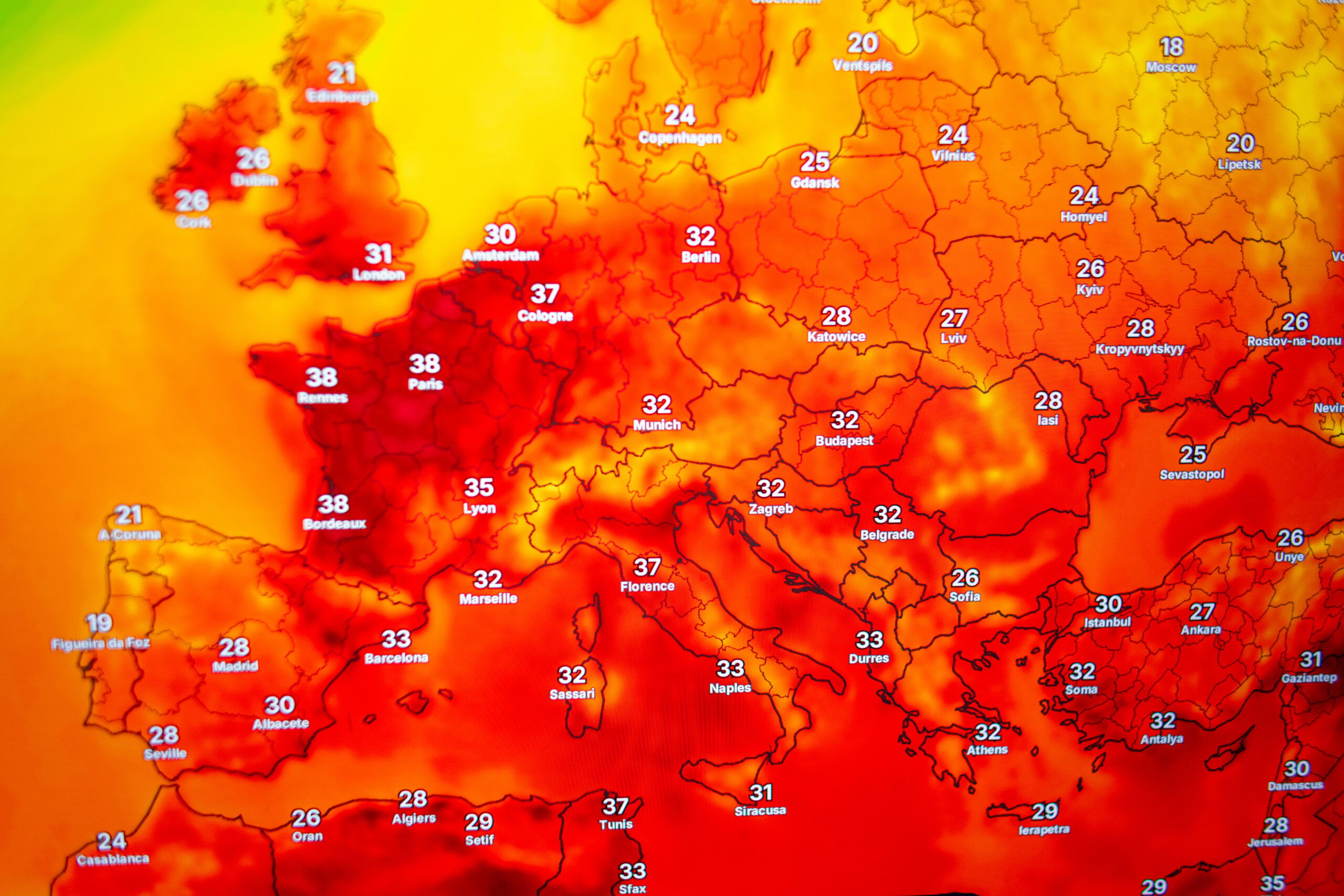 Weather forecast map shows extreme heatwave and high temperatures across Europe. Global warming, climate change, and anomalous summer heat concept with red hot temperatures.